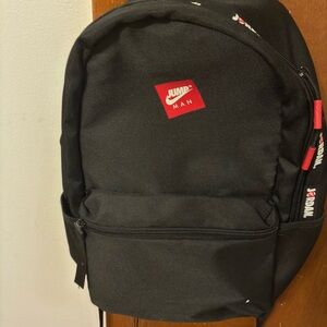 Jump Black Backpack with Red Logo